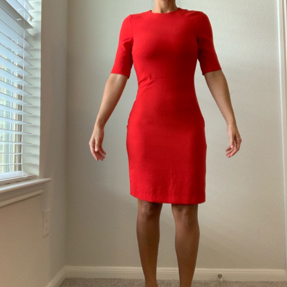 Worn once! Bright red dress with sleeves.